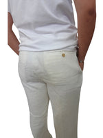 Banana Republic men's off-white linen trousers, high-rise tailored fit with back pockets, rear view.