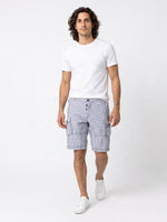 The Discount District men's blue checkered cotton cargo shorts with utility pockets and button closure.