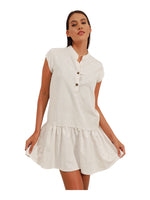 The Discount District off-white linen mini dress with a collared neckline, button front, and flowy skirt.