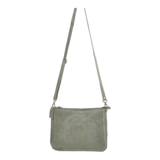 A green leather sling bag with a zipper and magnetic clasp, displayed against a white background.