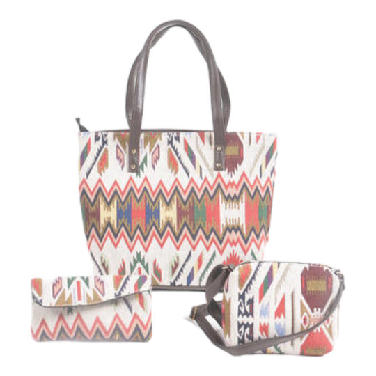 A set of three bags, including a tote bag, sling bag, and wallet, with multicolor geometric patterns.