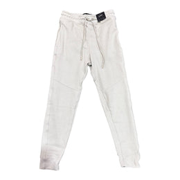 A pair of beige women's joggers with an elastic waistband and side pockets with zippers.