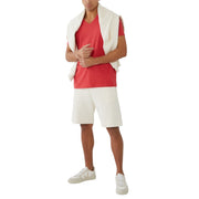 Men’s red V-neck T-Shirt by Armani Exchange styled with white shorts and sneakers, shown on model