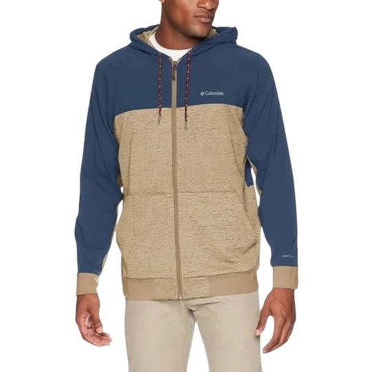 Model wearing Columbia men's hoodie in beige and navy blue, front view with zipper and pockets