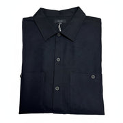COS black cotton long sleeve button-down shirt with double chest pockets, folded view.