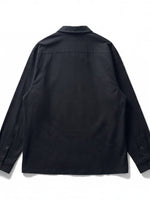 Back view of a COS black long-sleeve button-down shirt made from premium cotton with a structured collar.