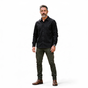 COS black long-sleeve cotton button-down shirt with double chest pockets on a male model.