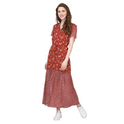 Gant mix print midi dress styled with sneakers – side walking view of model