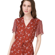 Close-up of Gant women's floral mix print midi dress showing tie waist and neckline