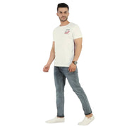 Gant white T-shirt with American flag chest print, full body front view on male model wearing jeans and sneakers