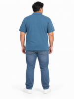 Back view of a man wearing a blue grey Giordano ribbed polo shirt with short sleeves and a slim fit.