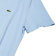 Detail of sleeve and side of Lacoste light blue V-neck T-Shirt made of cotton