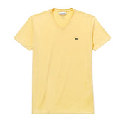 Flat lay of Lacoste yellow V-neck T-shirt with embroidered crocodile logo on left chest