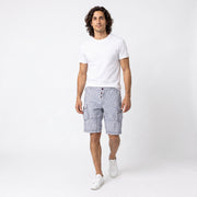 The Discount District men's blue checkered cotton cargo shorts with utility pockets and button closure.