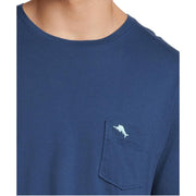 Detail of Tommy Bahama dolphin logo and chest pocket on navy blue T-shirt for men