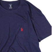 Close-up of red chest logo and patch pocket on men’s navy cotton T-Shirt by US Polo Assn.