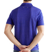 Back view of men’s blue linen polo shirt by Vilebrequin with vent eyelets below the collar